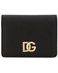 Dolce & Gabbana - Portafoglio in pelle nera con placca dg oro - Lyst