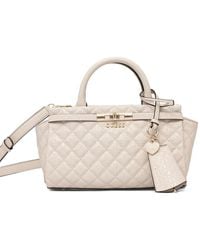 Guess - Gesteppte Idra Tote Bag mit Herzanhänger - Lyst