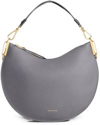 Coccinelle - Medium Sunup Crescent-Shaped Leather Shoulder Bag - Lyst