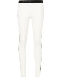 Balmain - Logo-trim leggings - Lyst