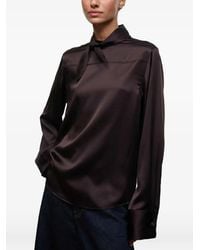 STAUD - Rhodes Pussy-Bow Button-Back Blouse - Lyst