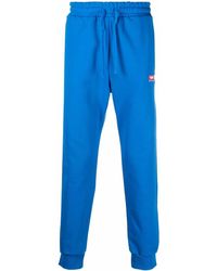 DIESEL Pantalones joggers ajustados con logo bordado - Azul