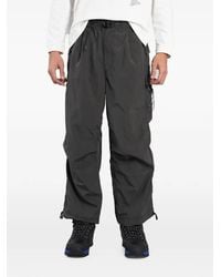 and wander - Belted Wide-Leg Cargo Trousers - Lyst