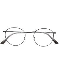 Calvin Klein Gafas con montura redonda - Negro