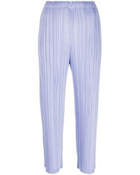 Pleats Please Issey Miyake - Pantalones ajustados con diseño plisado - Lyst