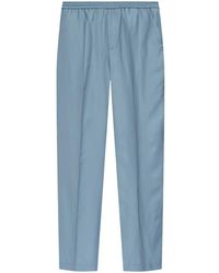 Versace - Pantalones con cinturilla elástica - Lyst