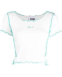 Izzue - Top corto con logo bordado - Lyst