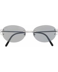 Cartier - Logo-engraved Oval Sunglasses - Lyst