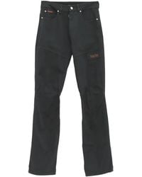 Martine Rose - Logo-Appliqué Jeans - Lyst