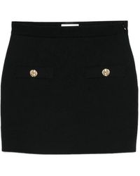 Balmain - Button-Embellished Knitted Mini Skirt - Lyst