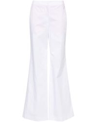 Moschino - Dart-detail Flared Trousers - Lyst