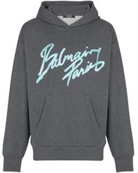Balmain - Sudadera de algodón estampada con capucha - Lyst