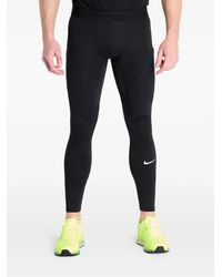Nike - Logo-Print Leggings - Lyst