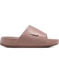 Nike - Calm Logo-Debossed Slides - Lyst