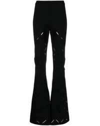 Versace - Pantaloni svasati con dettaglio cut-out - Lyst