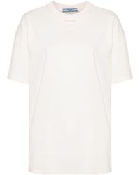 Prada - T-Shirt mit aufgesticktem Triangel-Logo - Lyst