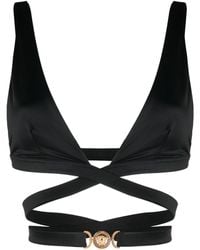 Versace - Top de bikini con aplique del logo - Lyst