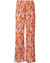 MSGM - Pleated Floral-print Trousers - Lyst