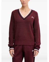 Guess - Gestreifter Pullover mit V-Ausschnitt - Lyst