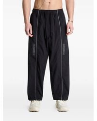 Pleasures - Sound Logo-Print Reflective-Piping Track Pants - Lyst