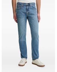 Levi's - 511 Logo-Patch Jeans - Lyst