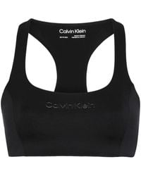 Calvin Klein - Sujetador deportivo con aplique del logo - Lyst