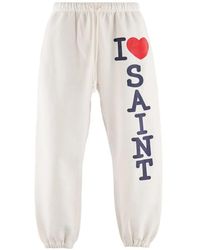 SAINT Mxxxxxx - Logo-Print Track Pants - Lyst