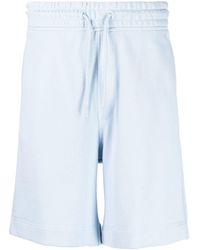 BOSS - Pantalones cortos de chándal con parche del logo - Lyst
