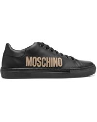 Moschino - Logo-embossed Leather Sneakers - Lyst
