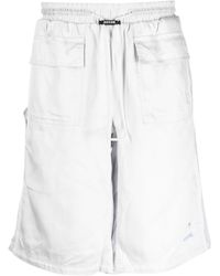 PUMA - Pantalones cortos de chándal con hebilla del logo - Lyst