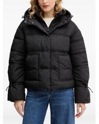 Guess - Hooded Embossed Jacket - Lyst