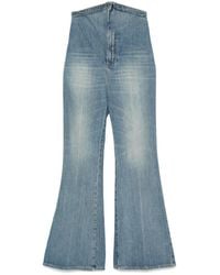 McQueen - Long Flared Jeans With Asymmetric Waist - Lyst