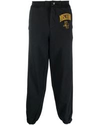 Moschino - Logo-Print Cotton Sweatpants - Lyst