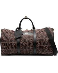 Moschino - Reisetasche mit Logo-Print - Lyst
