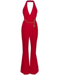 Moschino - Tuta con allacciatura al collo e dettaglio lucchetto - Lyst