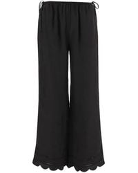 THE GARMENT - Scalloped-Hem Silk Trousers - Lyst