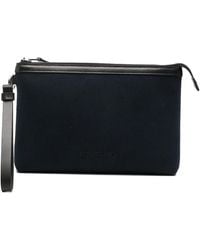 Tom Ford - Logo-Embossed Wrist-Strap Clutch Bag - Lyst