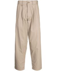 Chocoolate - Logo-patch Pleated Cotton Chinos - Lyst
