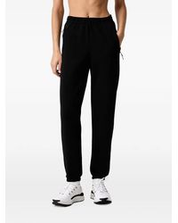 Under Armour - Unstoppable Fleece Gym Logo-Print Track Pants - Lyst