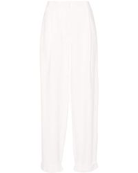 The Row - Tor Crepe Tapered Trousers - Lyst