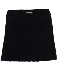 Miu Miu - Minijupe en tweed à patch logo - Lyst