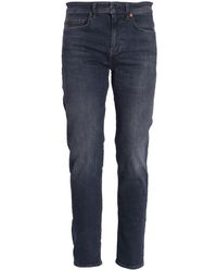 BOSS - Halbhohe Tapered-Jeans - Lyst