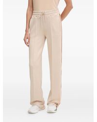 Guess - Gestreifte Jogginghose mit Kordelzug - Lyst