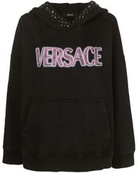 Versace - Logo-Print Studded Hoodie - Lyst