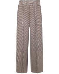 Issey Miyake - Pantaloni A Gamba Ampia Con Pieghe - Lyst