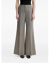 Filippa K - Flared Trousers - Lyst