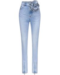 Area - Flower Corsage Ankle-Zip Jeans - Lyst