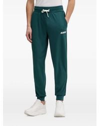 Guess - Logo-Print Side-Stripe Track Pants - Lyst