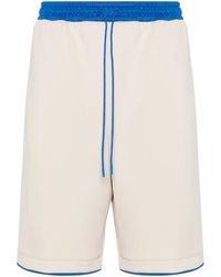 Gucci - Pantalones cortos de deporte con aplique del logo - Lyst