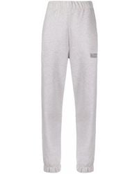 Ganni - Logo-embroidered Tapered Track Pants - Lyst